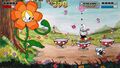 Cuphead and Mugman fighting Cagney Carnation in a pre-release version of the game